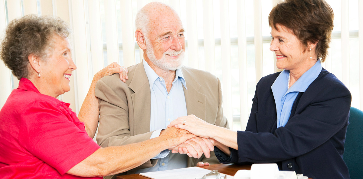 lawyer-holding-hands-with-seniors